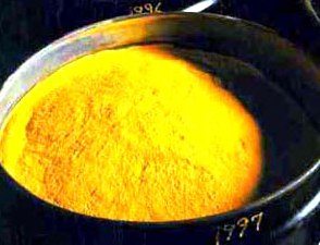 Uranium oxide, also known as yellow cake.