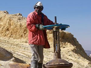 Miner working on mine dump