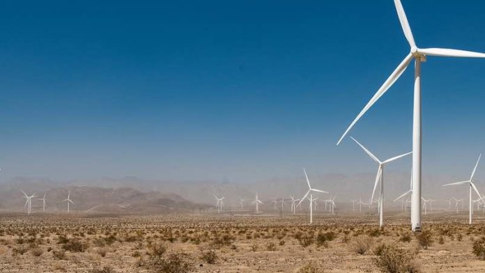 wind-trubine-farm-in-dusty-arid-valley-cc-Daxis
