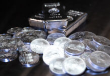Silver punches through $60/oz to set new record